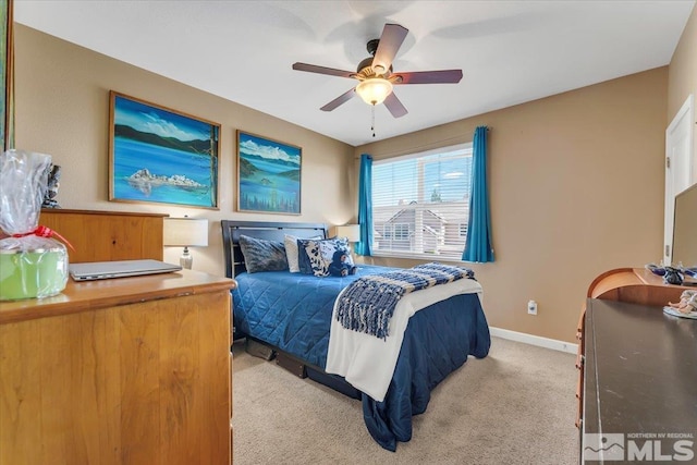 4889 Bougainvillea Cir, Sparks, NV 89436 - bedroom with carpet floors, baseboards, and ceiling fan