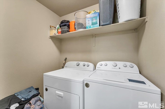 4889 Bougainvillea Cir, Sparks, NV 89436 - laundry area with washer and dryer
