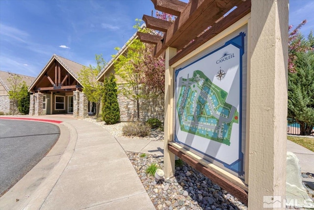 4889 Bougainvillea Cir, Sparks, NV 89436 - entrance to property with stone siding