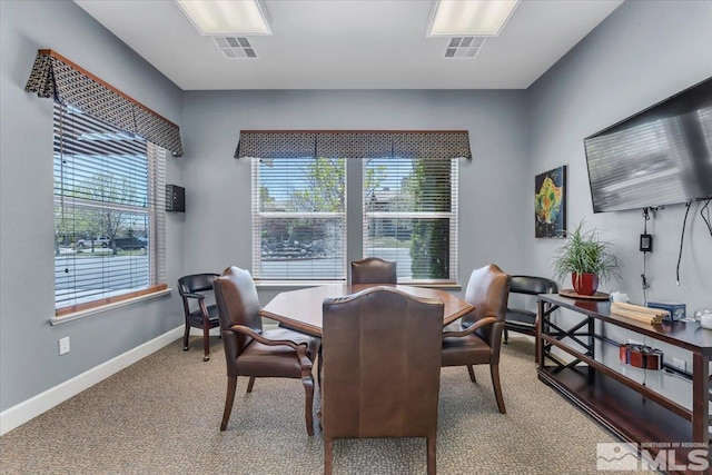 4889 Bougainvillea Cir, Sparks, NV 89436 - dining area with carpet floors and baseboards