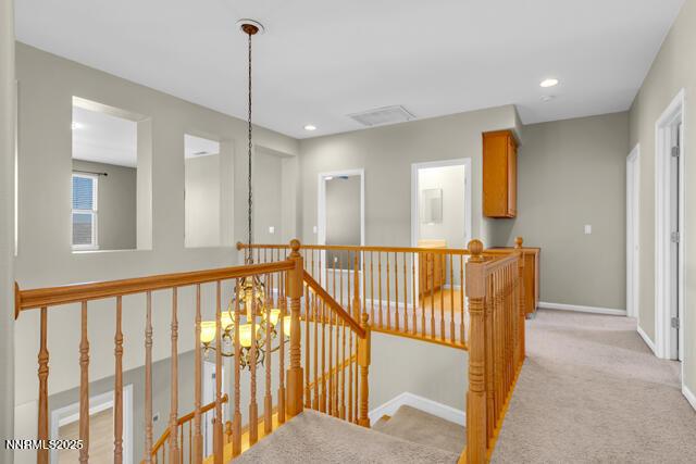 1095 S University Park Loop, Reno, NV 89512 - corridor with an upstairs landing, baseboards, light carpet, and recessed lighting