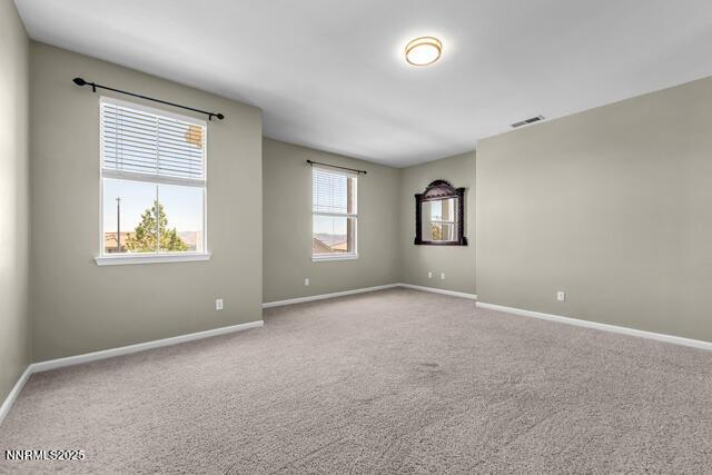 1095 S University Park Loop, Reno, NV 89512 - carpeted empty room featuring baseboards