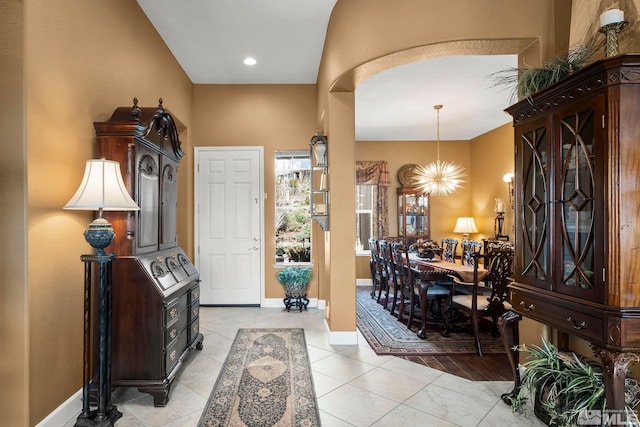 2370 Hickory Hl, Reno, NV 89523 - foyer with baseboards, light tile patterned flooring, and a chandelier
