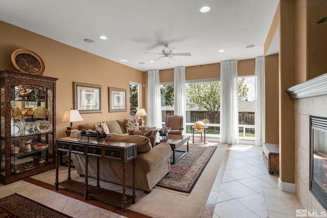 2370 Hickory Hl, Reno, NV 89523 - living area with light tile patterned flooring, ceiling fan, recessed lighting, and a tile fireplace