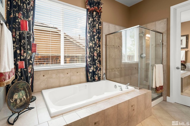 2370 Hickory Hl, Reno, NV 89523 - full bathroom featuring a stall shower, healthy amount of natural light, a garden tub, and tile patterned floors