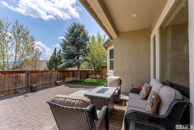 2370 Hickory Hl, Reno, NV 89523 - view of patio / terrace with an outdoor living space and a fenced backyard