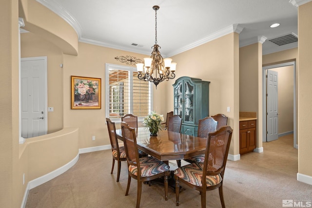 dining space featuring light carpet, a chandelier, ornamental molding, and baseboards