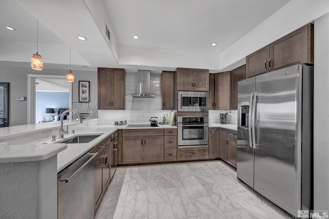 200 W 2nd St Unit 1202, Reno, NV 89501 - kitchen with stainless steel appliances, wall chimney exhaust hood, a sink, light marble finish floors, and light countertops