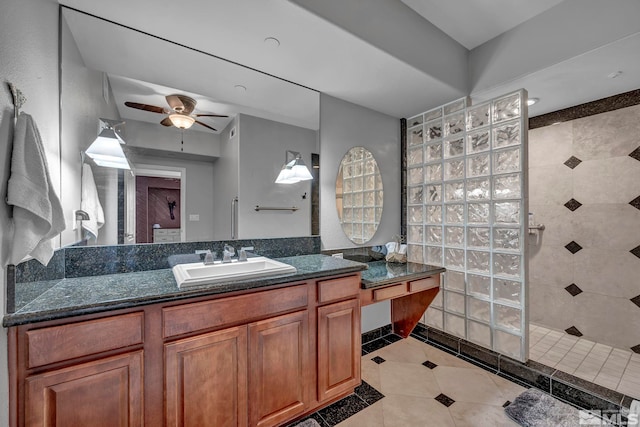 200 W 2nd St Unit 1202, Reno, NV 89501 - bathroom with tile patterned flooring, a walk in shower, vanity, and ceiling fan