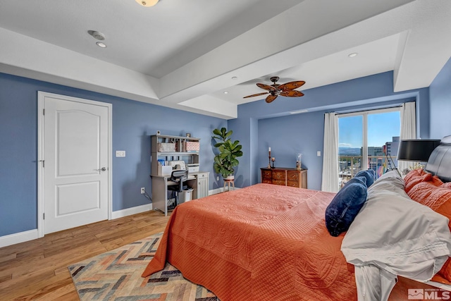 200 W 2nd St Unit 1202, Reno, NV 89501 - bedroom with access to outside, wood finished floors, baseboards, ceiling fan, and recessed lighting