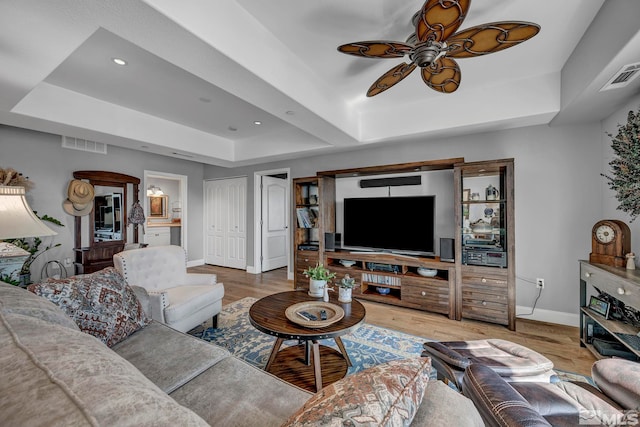 200 W 2nd St Unit 1202, Reno, NV 89501 - living room with a raised ceiling, baseboards, a ceiling fan, wood finished floors, and recessed lighting