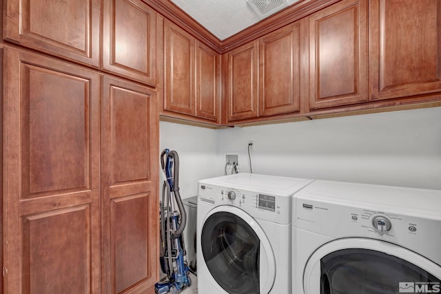 200 W 2nd St Unit 1202, Reno, NV 89501 - washroom with washer and dryer and cabinet space