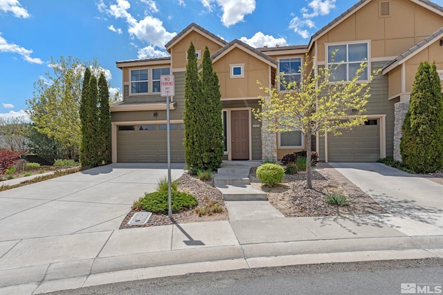 4845 Bougainvillea Cir, Sparks, NV 89436 - view of front facade with an attached garage and driveway
