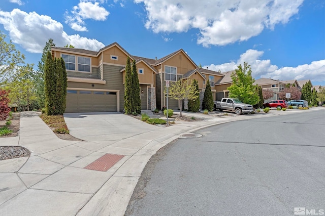 4845 Bougainvillea Cir, Sparks, NV 89436 - view of property with a residential view, a garage, and driveway