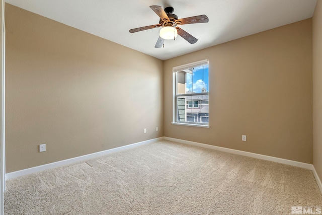 4845 Bougainvillea Cir, Sparks, NV 89436 - unfurnished room with baseboards, light carpet, and a ceiling fan