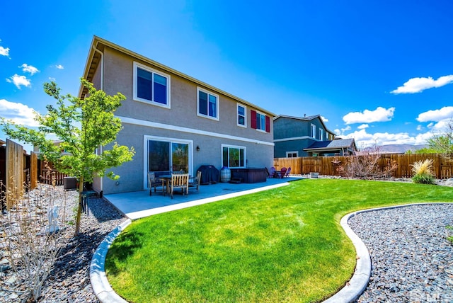 2282 Selway Dr, Sparks, NV 89436 - rear view of property featuring a hot tub, stucco siding, a patio area, and central AC unit