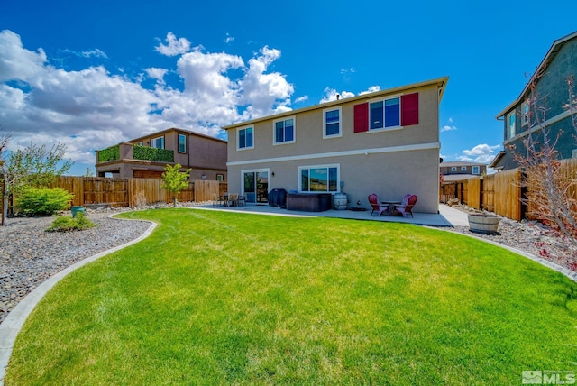 2282 Selway Dr, Sparks, NV 89436 - back of house with a patio, stucco siding, and a hot tub