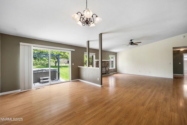 2120 Keystone Ave, Reno, NV 89503 - unfurnished living room with a chandelier, ceiling fan, and wood finished floors