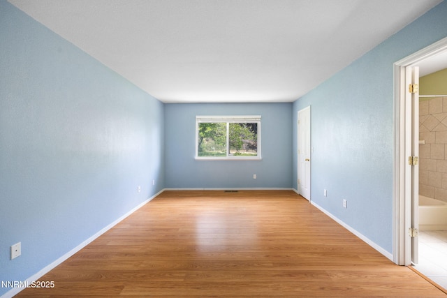 2120 Keystone Ave, Reno, NV 89503 - spare room featuring light wood-style flooring and baseboards