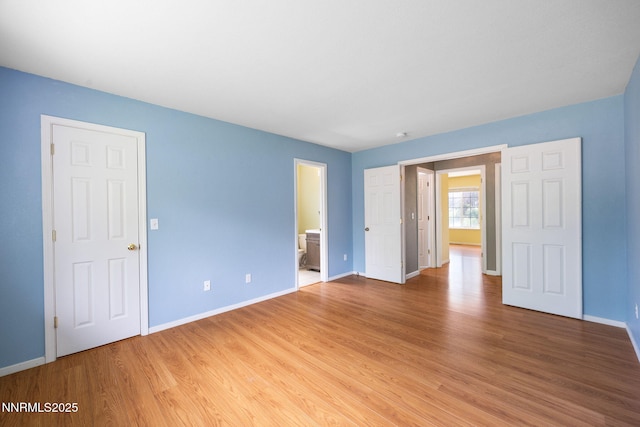 2120 Keystone Ave, Reno, NV 89503 - unfurnished room featuring baseboards and light wood-style floors