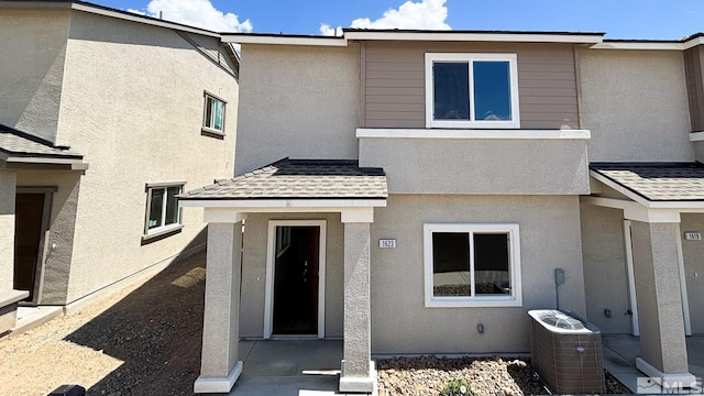 1623 Prancer St Lot # 51, Reno, NV 89523 - view of front of property with cooling unit, stucco siding, and a patio area