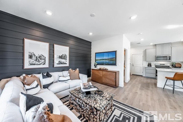 1623 Prancer St Lot # 51, Reno, NV 89523 - living area featuring baseboards, light wood-type flooring, and recessed lighting