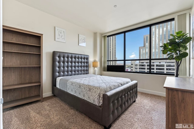 450 N Arlington Unit 1403, Reno, NV 89503 - carpeted bedroom featuring baseboards