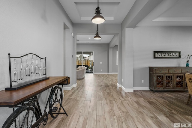 9713 Silverspar St, Reno, NV 89521 - entrance foyer featuring wood finished floors, baseboards, and a tray ceiling