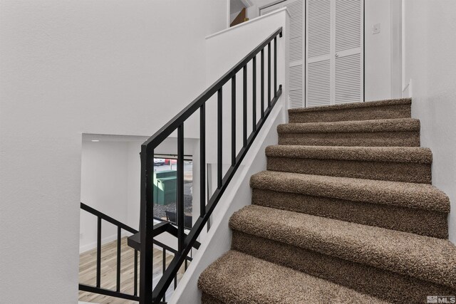 4580 Matich Dr, Reno, NV 89502 - stairs with wood finished floors