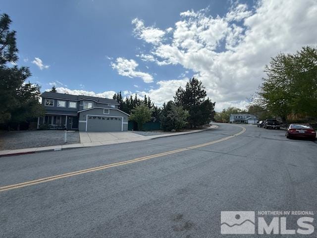 6700 Sandia Dr, Reno, NV 89523 - view of asphalt street featuring sidewalks