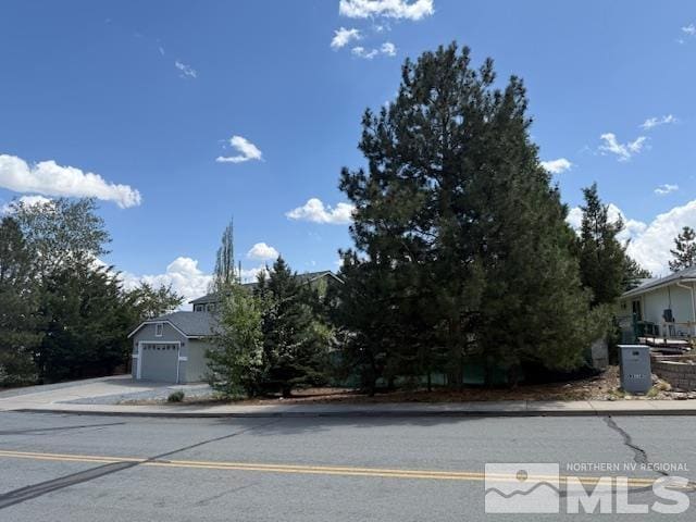 6700 Sandia Dr, Reno, NV 89523 - view of front facade featuring concrete driveway and an attached garage