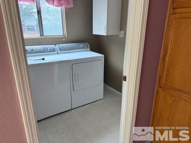 6700 Sandia Dr, Reno, NV 89523 - clothes washing area featuring cabinet space and washing machine and dryer