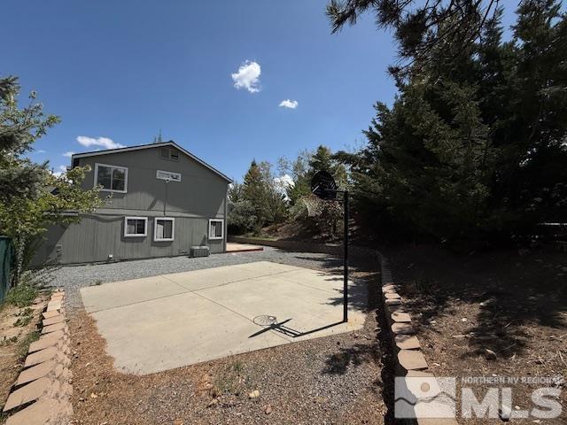 6700 Sandia Dr, Reno, NV 89523 - view of home's exterior with a patio area and central AC