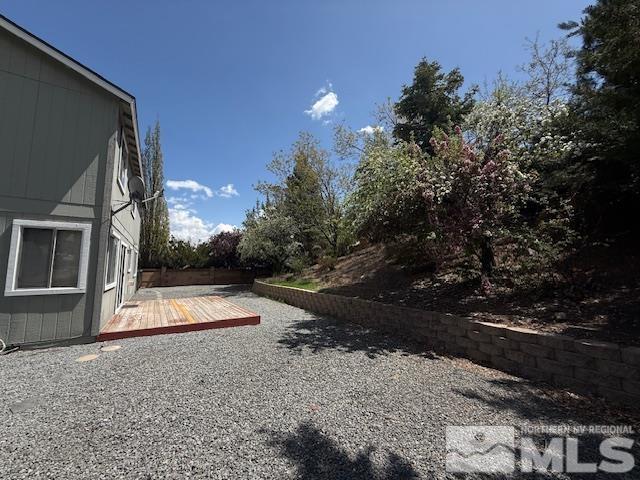 6700 Sandia Dr, Reno, NV 89523 - view of yard with a deck