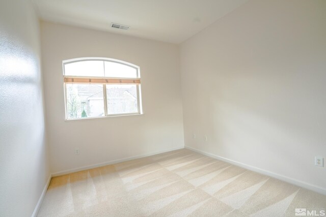 9900 Wilbur May Unit 3403, Reno, NV 89521 - empty room with light colored carpet and baseboards