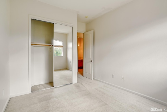9900 Wilbur May Unit 3403, Reno, NV 89521 - unfurnished bedroom with carpet floors, a closet, and baseboards
