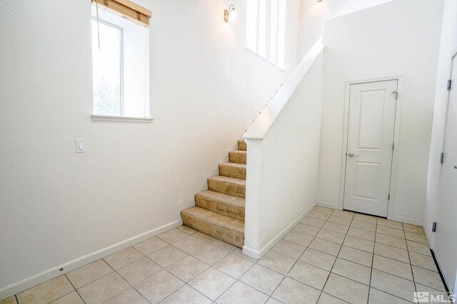 9900 Wilbur May Unit 3403, Reno, NV 89521 - staircase with tile patterned flooring and baseboards
