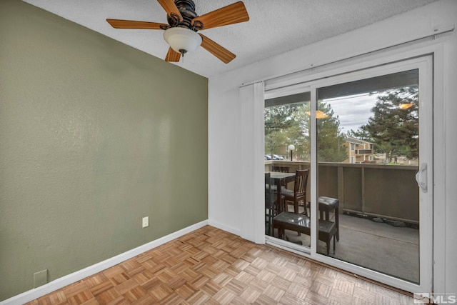 3865 E Leonesio Dr Unit F1, Reno, NV 89512 - unfurnished room with baseboards, a textured ceiling, and ceiling fan