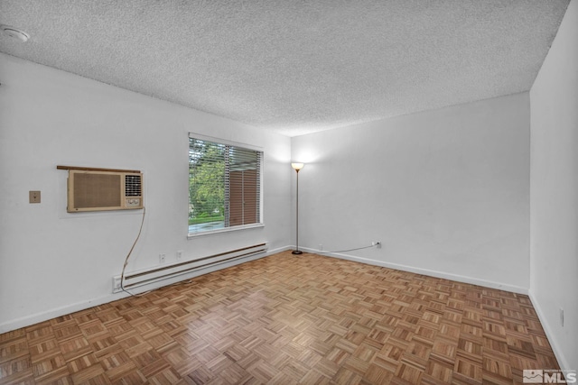 3865 E Leonesio Dr Unit F1, Reno, NV 89512 - spare room with baseboard heating, an AC wall unit, a textured ceiling, and baseboards
