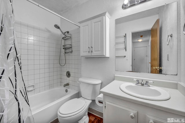 3865 E Leonesio Dr Unit F1, Reno, NV 89512 - full bathroom featuring toilet, shower / tub combo with curtain, vanity, and wood finished floors