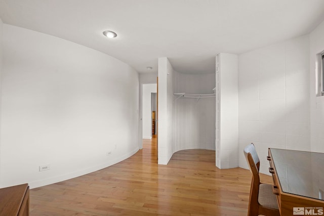 2040 Scharr Cir, Reno, NV 89509 - unfurnished bedroom featuring light wood finished floors, a closet, and baseboards