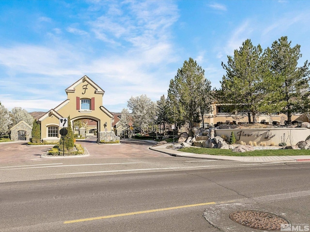 9900 Wilbur May Pkwy Unit 3102, Reno, NV 89521 - view of asphalt road featuring curbs and sidewalks