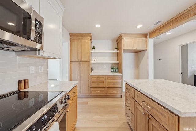 983 Melba Dr, Reno, NV 89503 - kitchen featuring stainless steel appliances, decorative backsplash, open shelves, light wood-style flooring, and recessed lighting