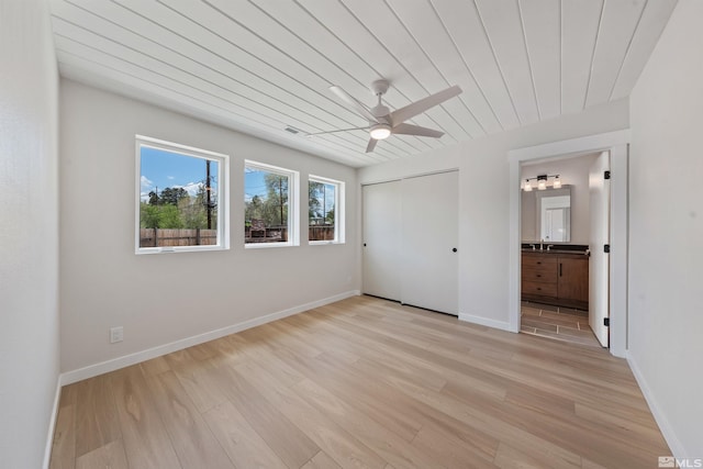 983 Melba Dr, Reno, NV 89503 - unfurnished bedroom featuring light wood finished floors, a closet, baseboards, and a sink