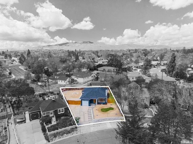 983 Melba Dr, Reno, NV 89503 - aerial perspective of suburban area featuring mountains and property boundaries highlighted