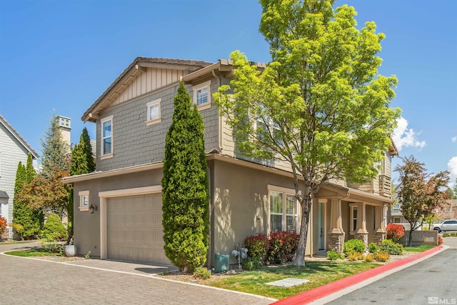 7609 Stone Bluff Way, Reno, NV 89523 - view of front of house with an attached garage and stucco siding