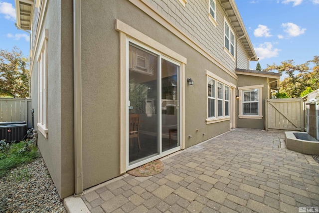 7609 Stone Bluff Way, Reno, NV 89523 - view of patio / terrace featuring a gate, fence, and central air condition unit