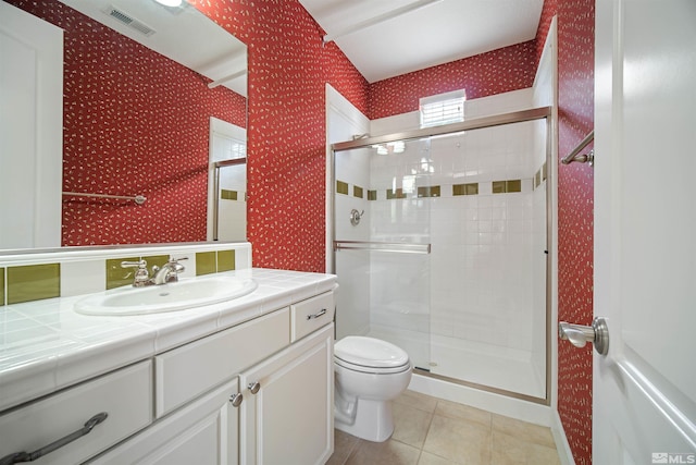 7609 Stone Bluff Way, Reno, NV 89523 - full bathroom with wallpapered walls, toilet, a shower stall, tile patterned floors, and vanity