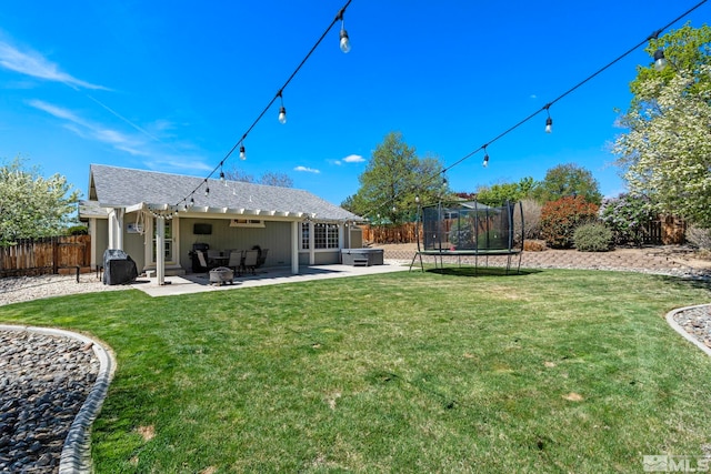 1359 Whooping Crane Dr, Sparks, NV 89441 - rear view of house featuring a trampoline and a patio area