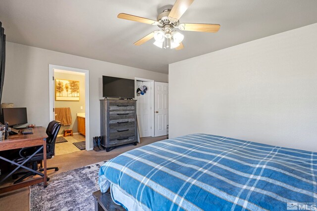 1359 Whooping Crane Dr, Sparks, NV 89441 - bedroom with light colored carpet, ceiling fan, an office area, and connected bathroom